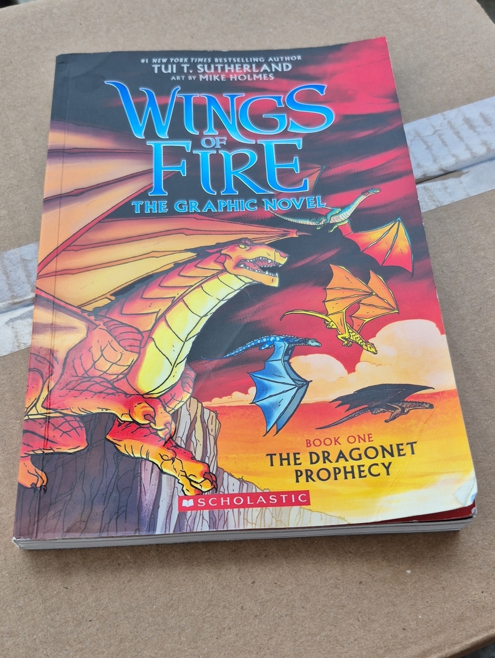 Scholastic Wings of Fire Graphic Novel — Red, Yellow, Blue Cover
